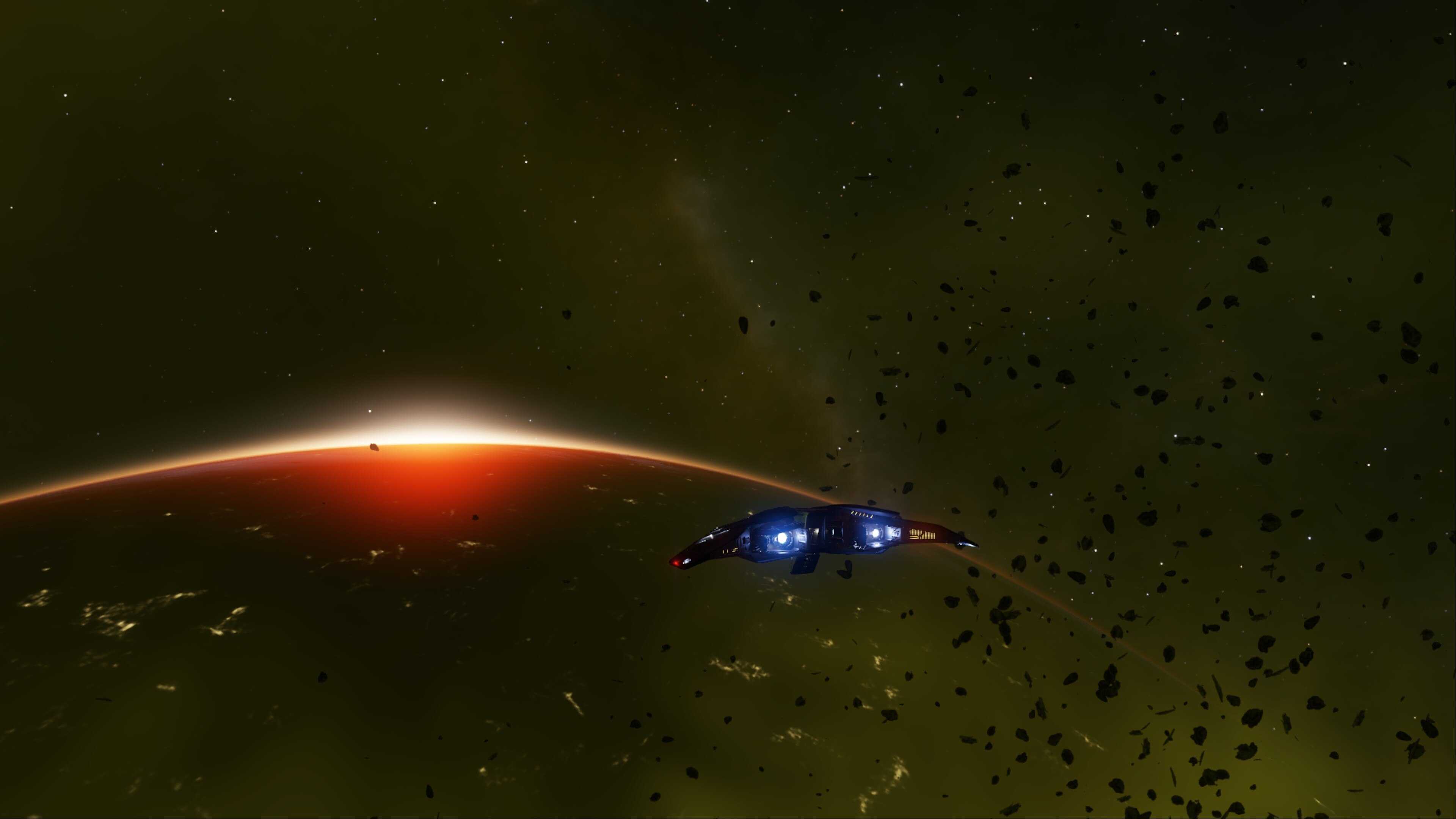 A screenshot from Elite Dangerous, taken in orbit around Earth on the outskirts of the Thargoid Cocijo graveyard.