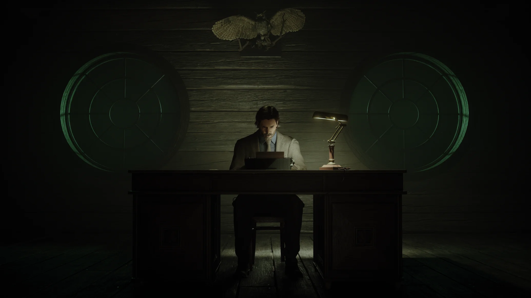 A screenshot of Alan Wake sitting at a desk, bent over a typewriter